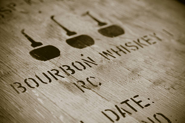 Bourbon whiskey identification stencilled on a wooden barrel head