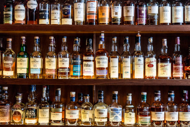 Selection of Scotch whisky bottles on shelves